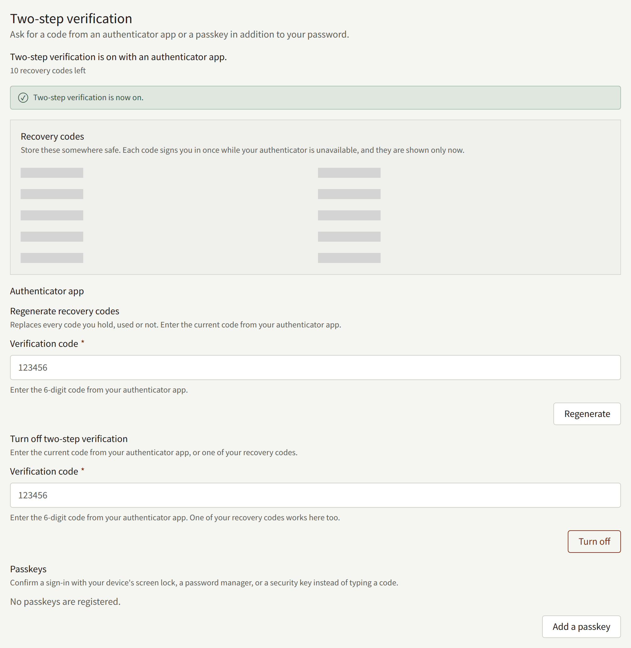 Two-step verification just turned on: the ten recovery codes, covered over in this picture, the Regenerate recovery codes and Turn off two-step verification forms below them, and the Passkeys part with Add a passkey.